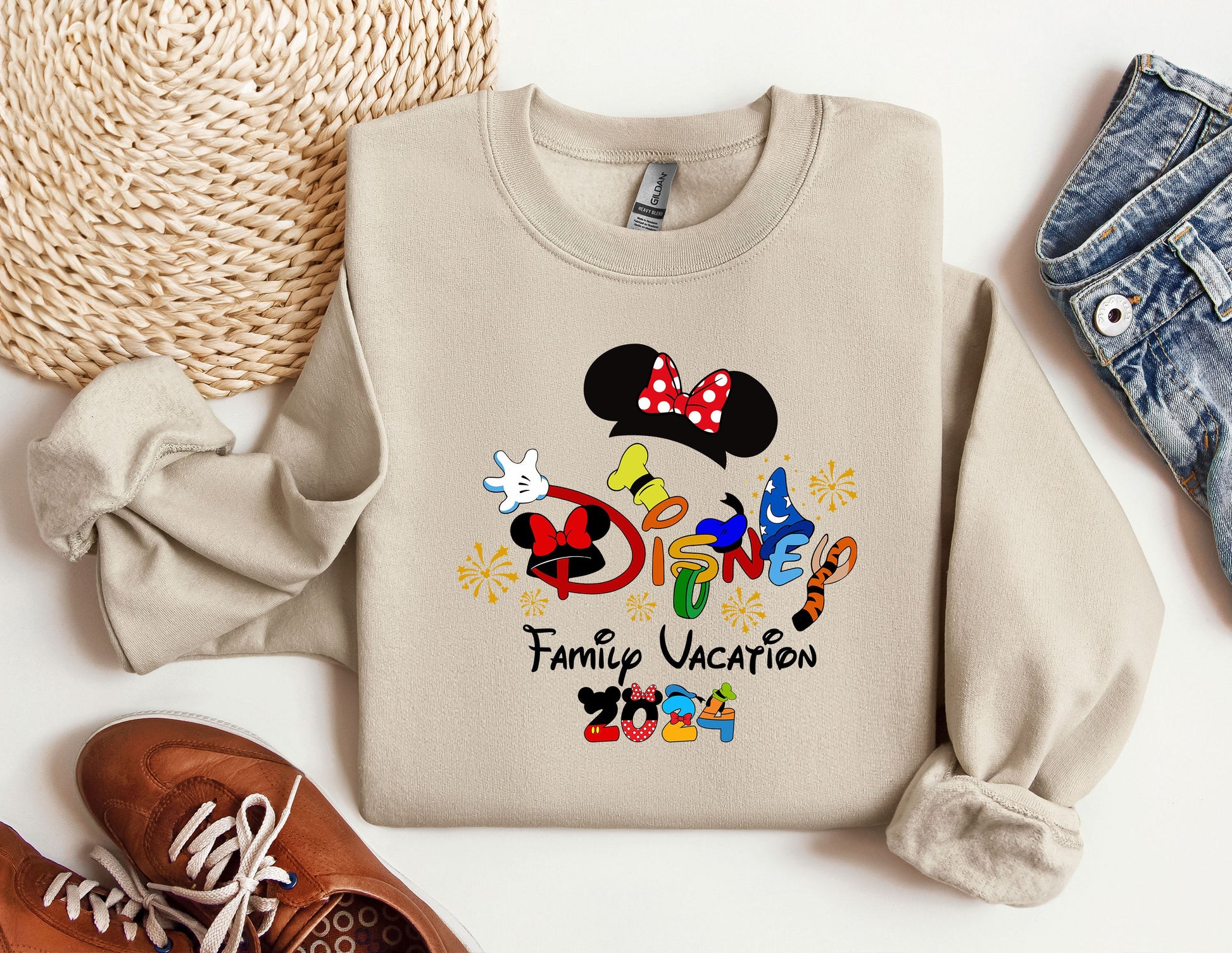 a sweater with a mickey mouse design on it