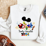 a mickey mouse family vacation shirt next to a pair of shoes