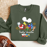 a mickey mouse family vacation sweatshirt next to a pair of sneakers