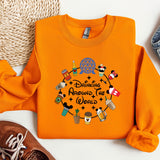 an orange shirt that says disney around the world