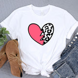 a white t - shirt with a pink heart and leopard print