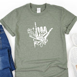 a t - shirt with the word air on it next to a pair of jeans