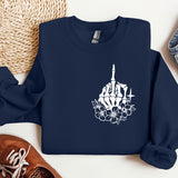 a blue sweatshirt with a picture of a building and flowers on it