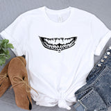 a white t - shirt with a smile drawn on it