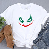 a t - shirt with a joker face painted on it