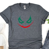 a t - shirt with a joker face painted on it