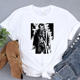 a white t - shirt with a black and white image of a man holding a
