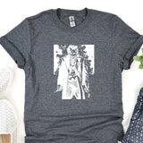 a t - shirt with a picture of a zombie holding a knife