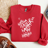 a red sweatshirt with white letters on it next to a pair of shoes
