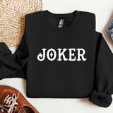 a black sweater with the word joker printed on it
