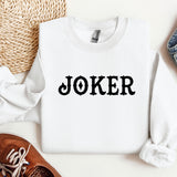 a white sweater with the word joker printed on it