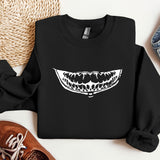 a black sweatshirt with an image of a mouth on it