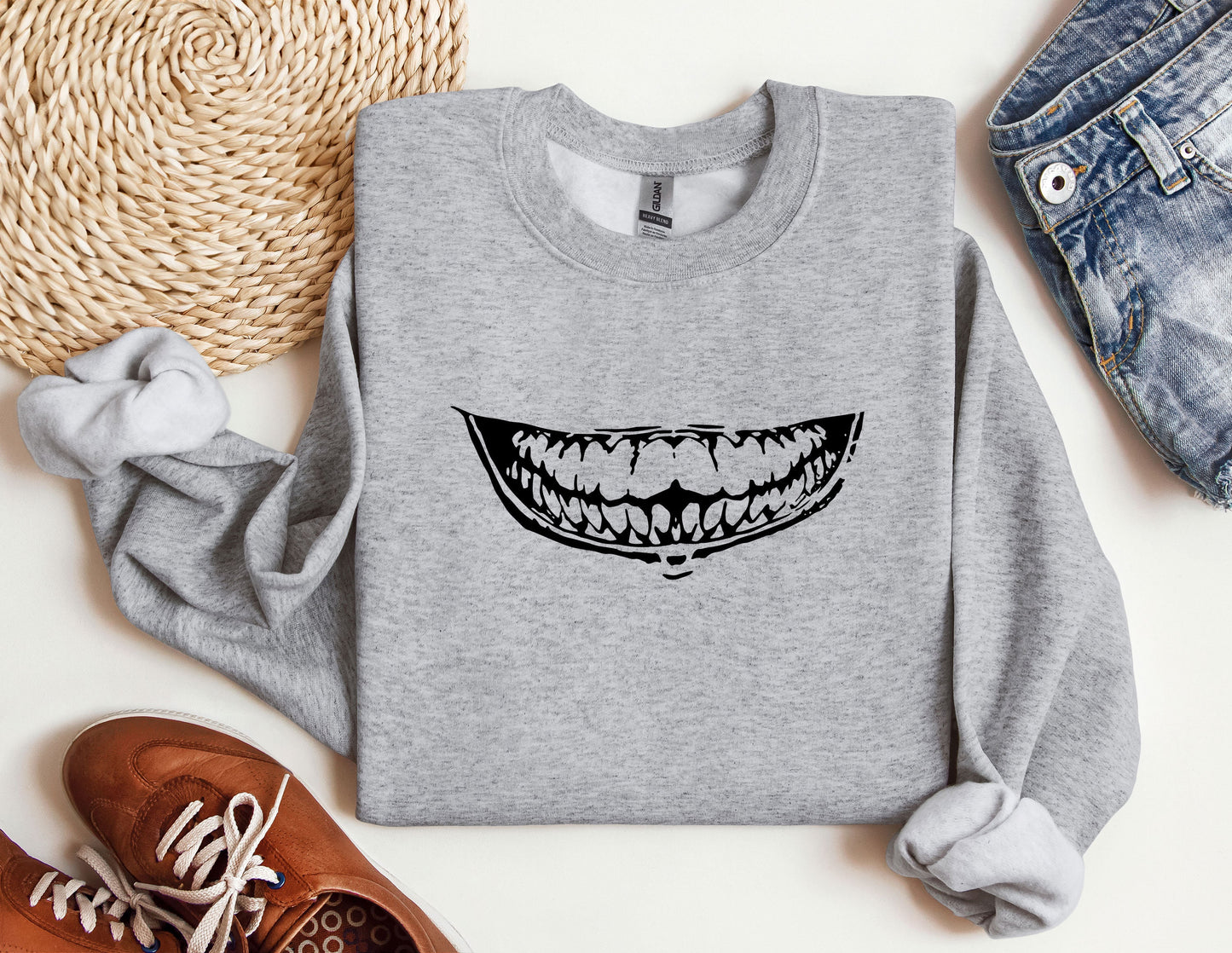 a sweater with a smile drawn on it