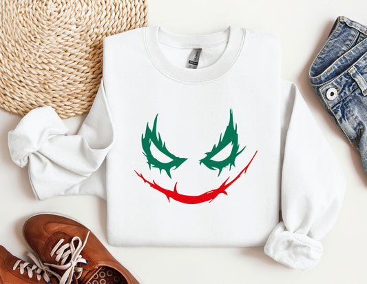 a sweater with a joker face painted on it