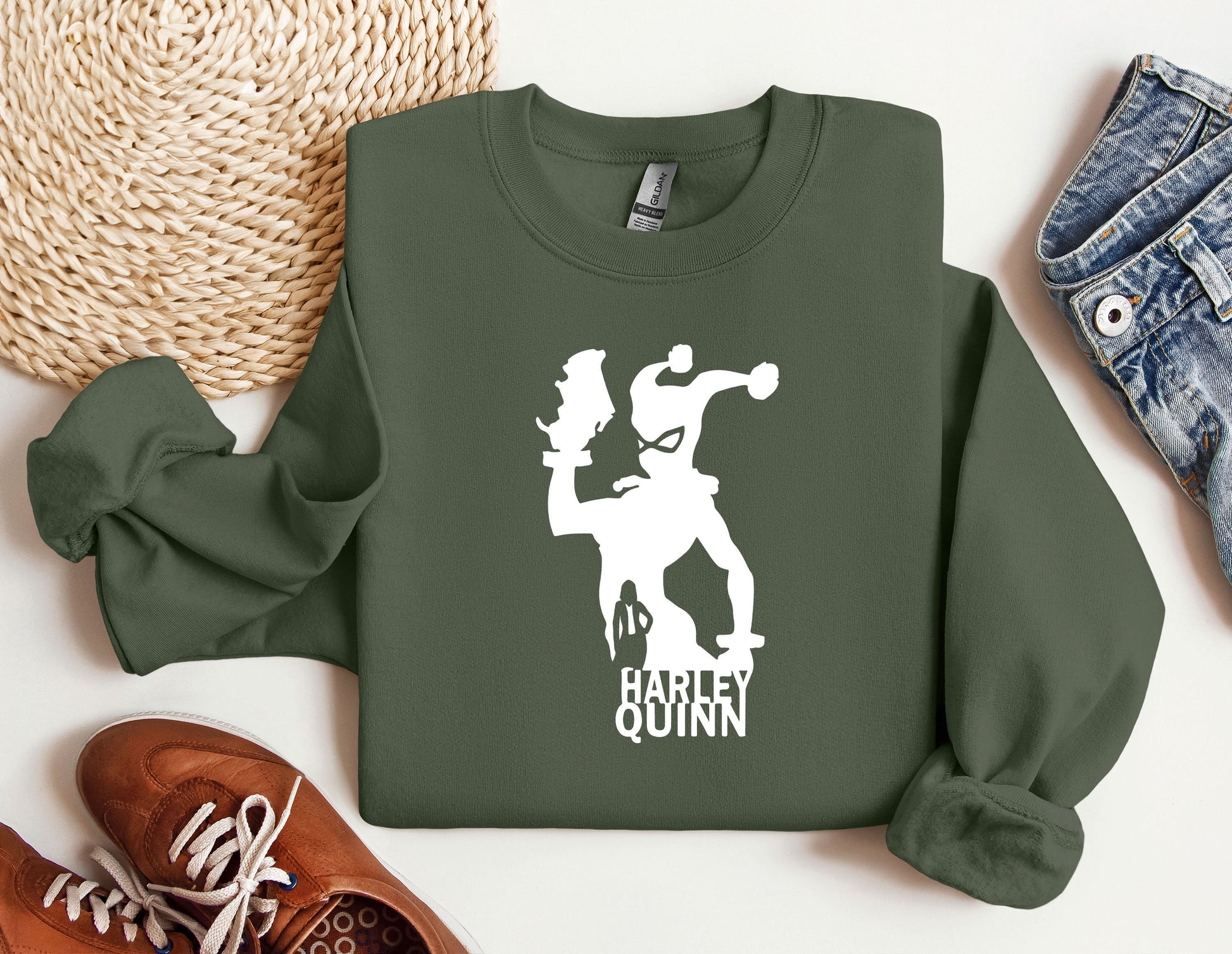 a green sweatshirt with a picture of a man on it