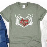 a t - shirt with the words love and peace on it