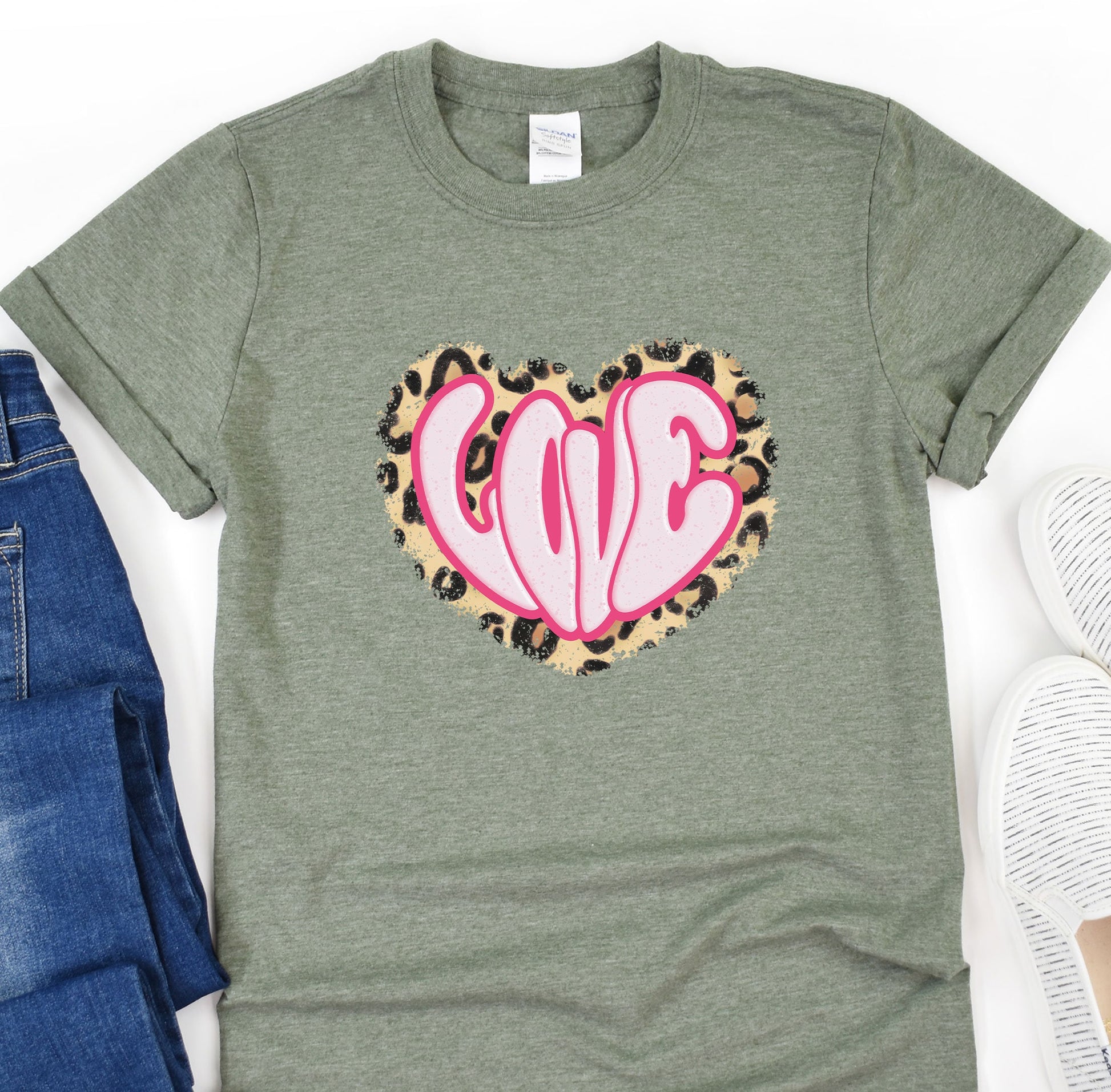 a t - shirt with a leopard print heart on it