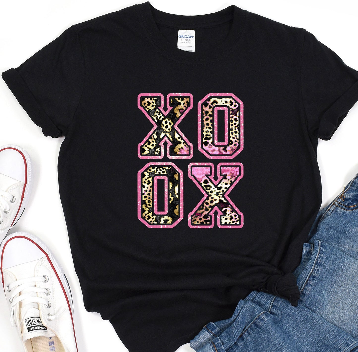 a t - shirt with the word ox ox on it