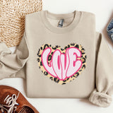 a pair of shoes, a sweater, and a pair of jeans on a white