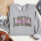 a sweatshirt with the word love written in leopard print