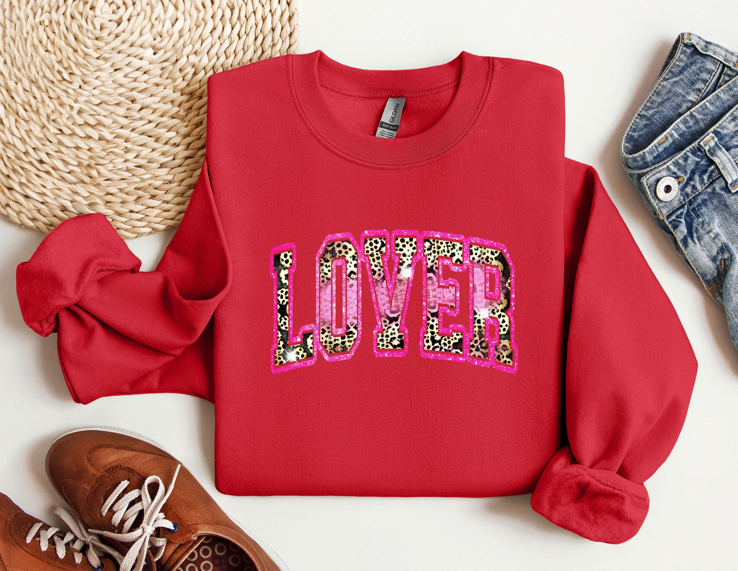 a red sweatshirt with the word love on it