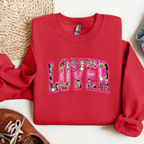a red sweatshirt with the word love on it