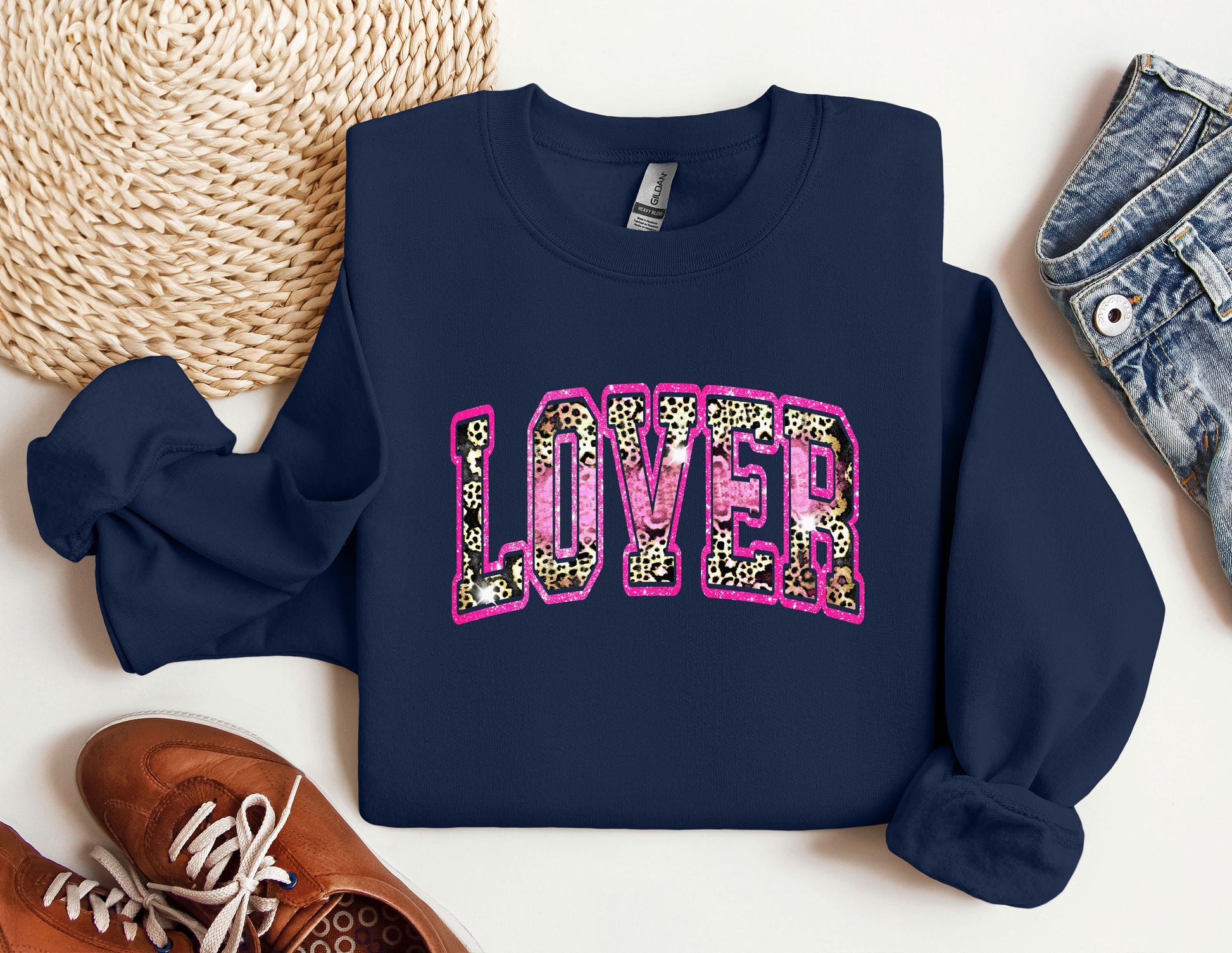 a sweatshirt with the word love spelled in leopard print