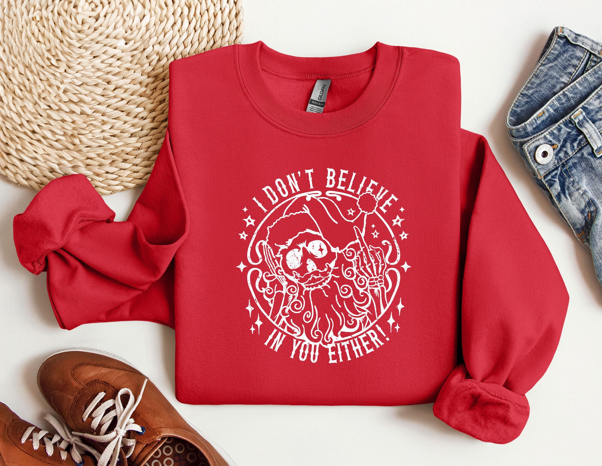 a red sweatshirt with a santa clause on it