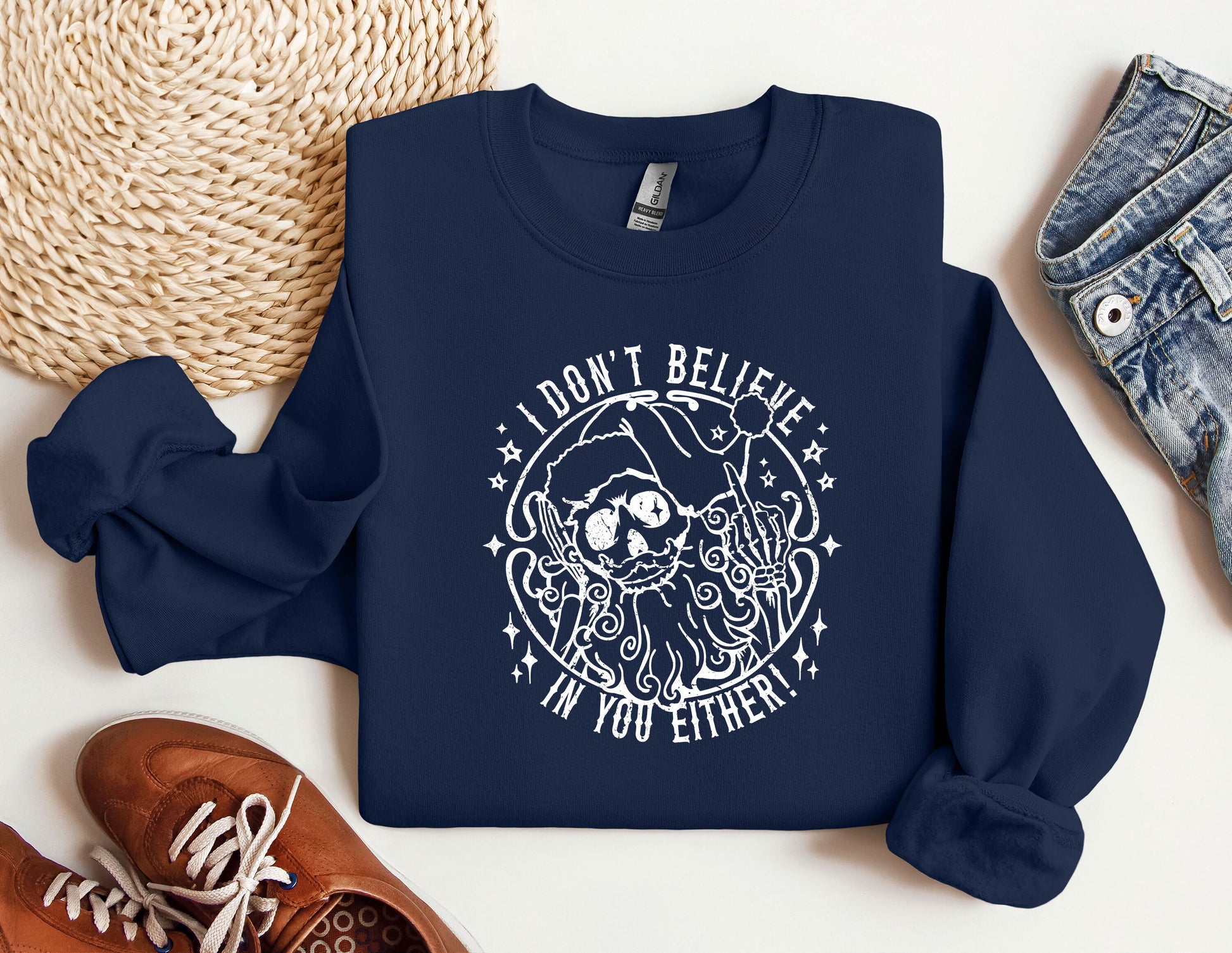 a blue sweatshirt with an image of a skeleton on it