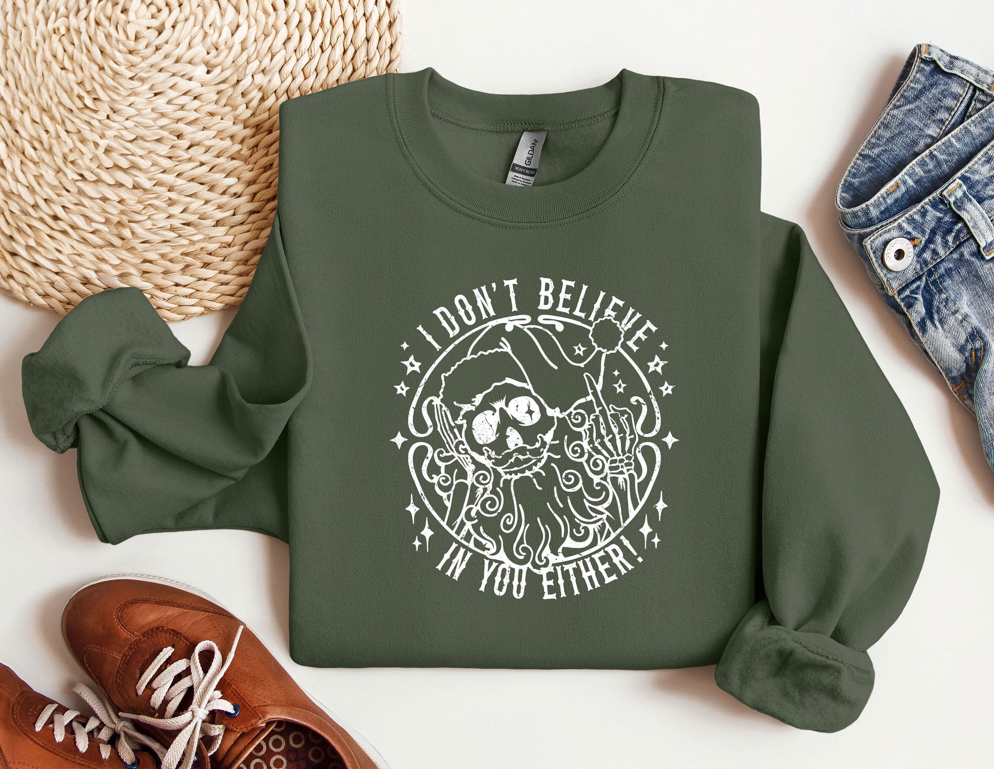 a green sweatshirt with a picture of a skeleton on it