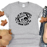 a women's t - shirt with a football design