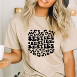 a woman wearing a t - shirt that says besties besties