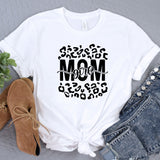 a t - shirt with the word mom printed on it