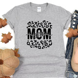 a t - shirt with the word mom printed on it