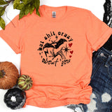 a t - shirt with a picture of a horse on it