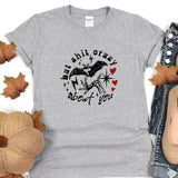 a t - shirt with a picture of a bird on it