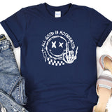 a t - shirt with a picture of a person's hand on it