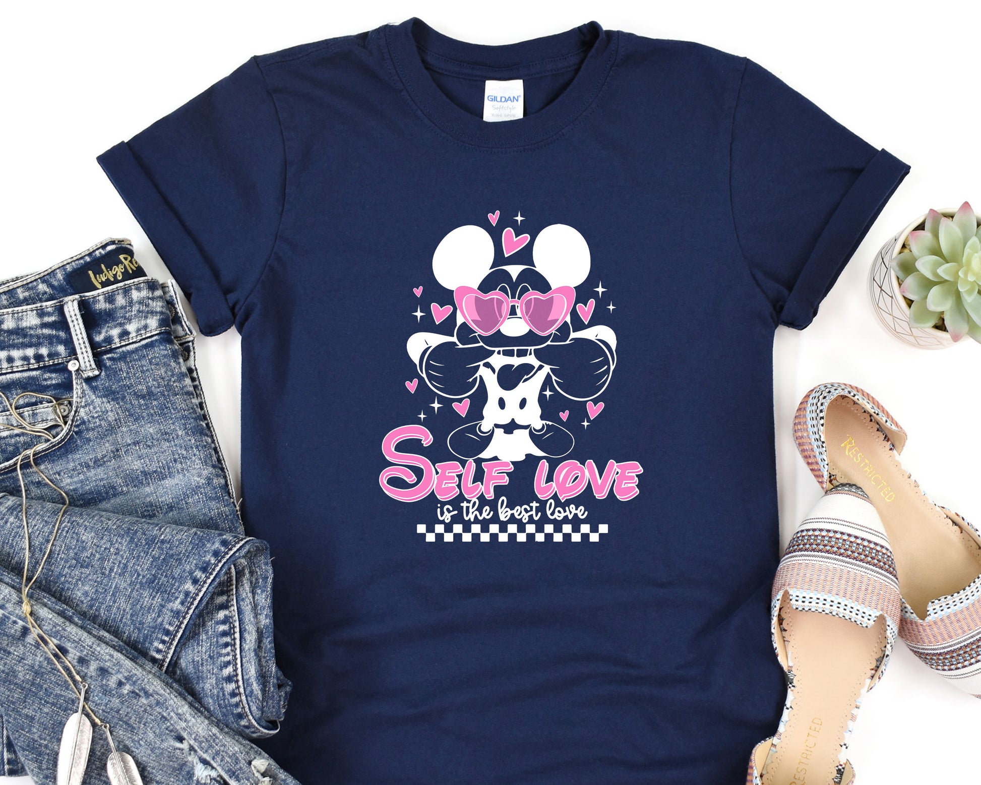 a t - shirt with a minnie mouse design on it