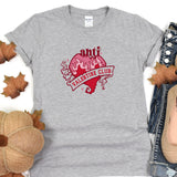 a t - shirt with a heart and a ribbon on it