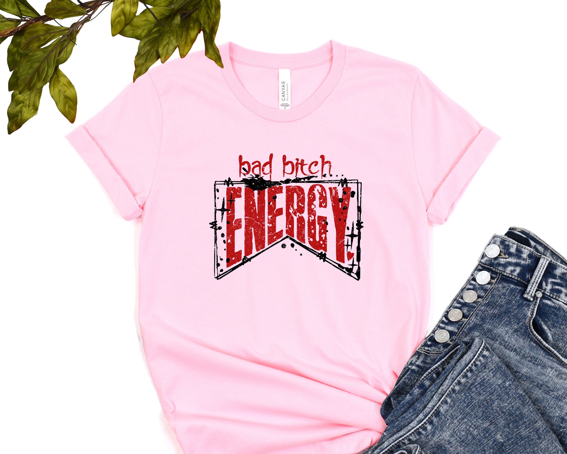 a pink t - shirt with the words bad bitch energy on it