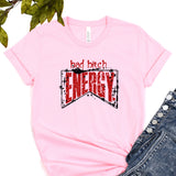 a pink t - shirt with the words bad bitch energy on it