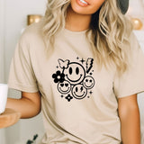 a woman wearing a t - shirt with a smiley face on it
