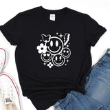 a t - shirt with a smiley face on it