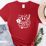 a red shirt with a smiley face on it