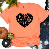 a t - shirt with a black heart on it