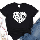 a black t - shirt with a white heart and the word blac on