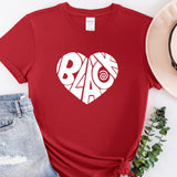 a red t - shirt with the word baq on it next to a hat
