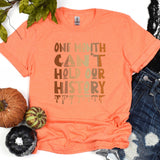 a t - shirt that says, one with can't hold our history
