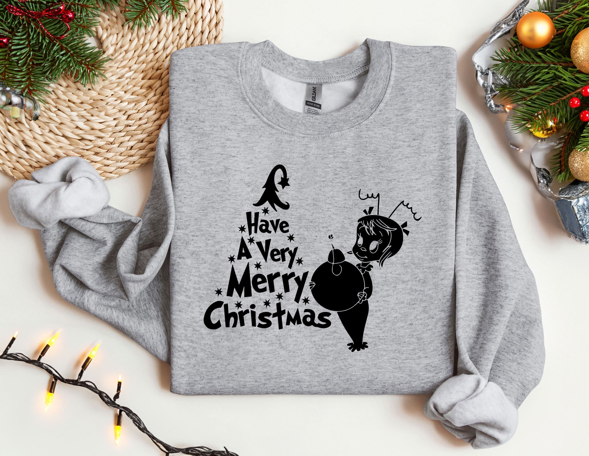 a grey sweatshirt with a christmas design on it