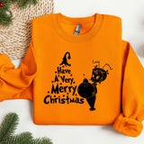 an orange sweatshirt with a christmas message on it